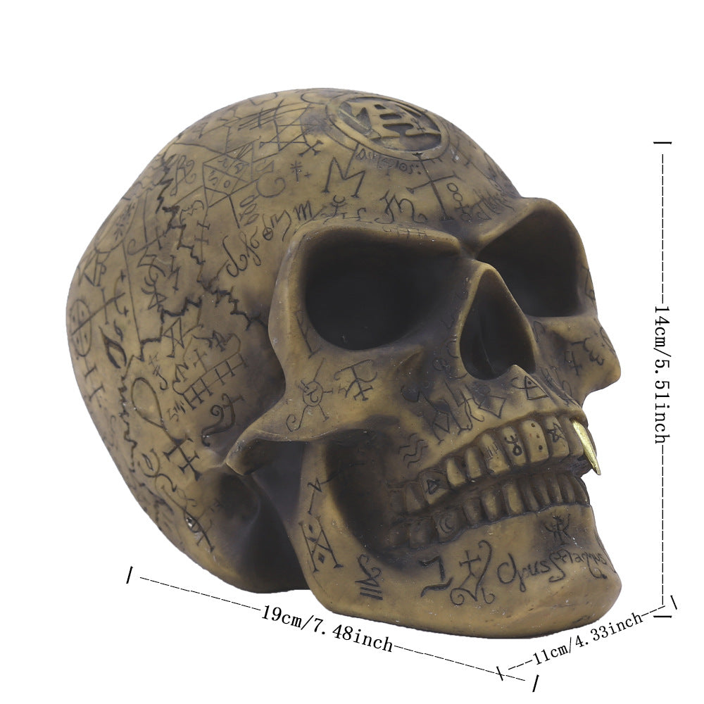 Mystic Runic Skull Statue with Gold Fang – Hand-Painted Resin Gothic Decor Figurine